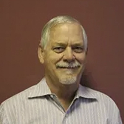 A headshot of Dr. Thomas W. Johnson, a chiropractor at Atlanta Chiropractic Injury Center.